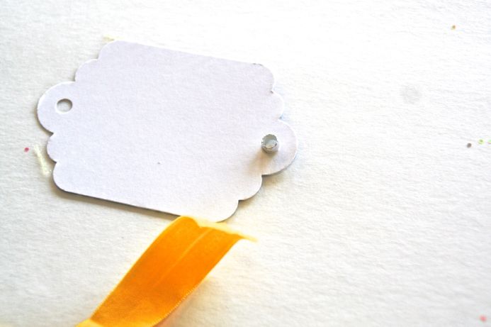 How to make a diy elastic tag bookmark on Dear Handmade Life